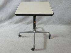 A vintage Herman Miller for Charles Eames centre table on aluminium castered quadruped base. H.65