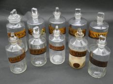 A matching set of ten 19th century apothecary's chemical bottles with their stoppers, various labels