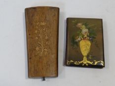 A Victorian papier-mâché painted and gilded aide-mémoire, with pencil along with a blue velvet lined