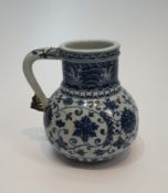 A Chinese blue and white Islamic market pattern porcelain jug/tankard with scrolling form handle