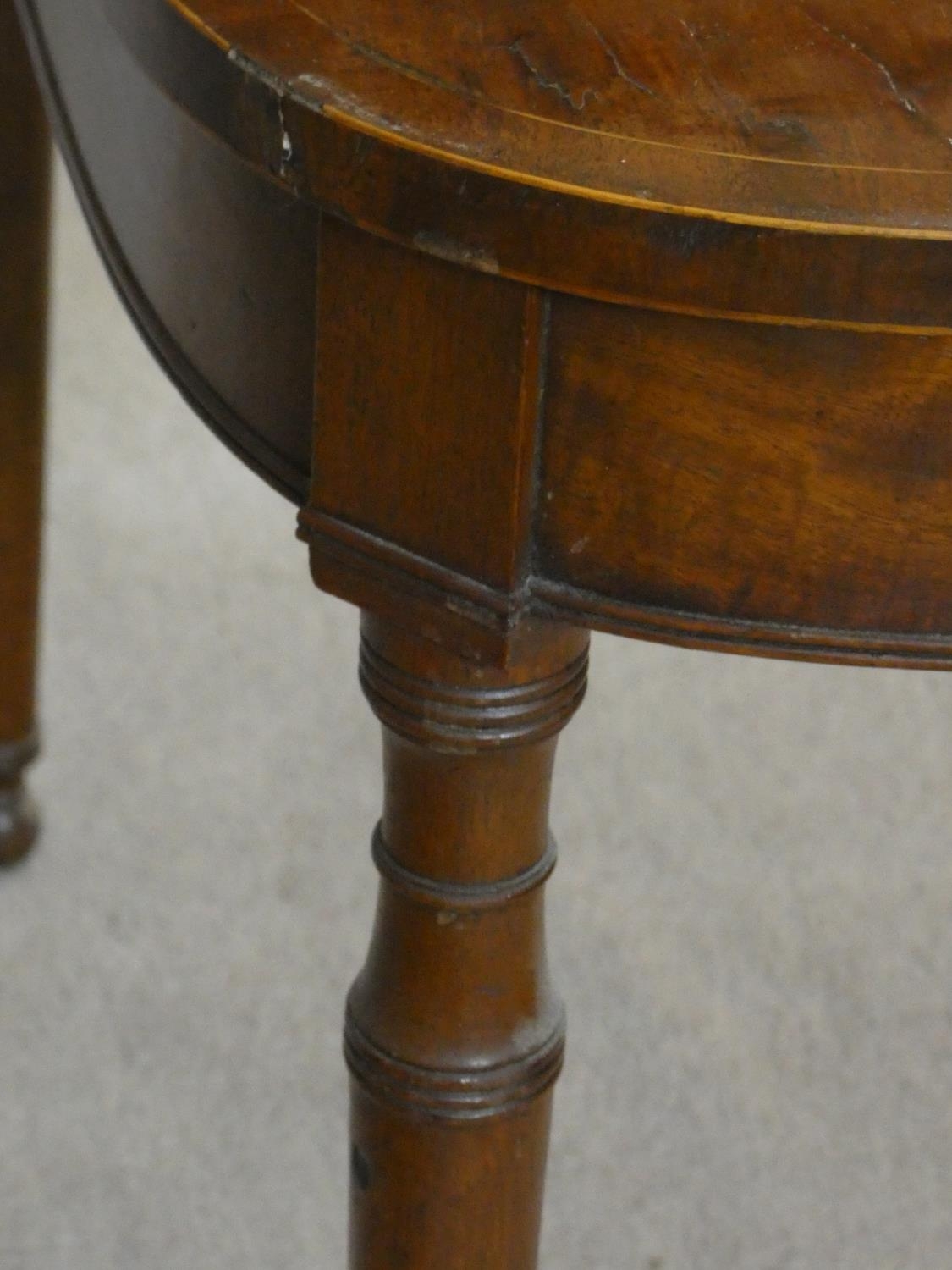 A 19th century mahogany and satinwood strung foldover top tea table on turned tapering supports. H. - Image 3 of 3