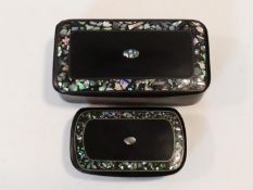 Two Victorian black papier-mâché snuff boxes inlaid with chips of abalone shell, and a shell border.