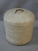 Two North African inspired rattan stools, stuffed and heavily weighted. H.53 W.41 L.41cm