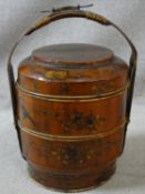 A Japanese cane lidded twin section basket with all over painted bird and flower decoration. H.40