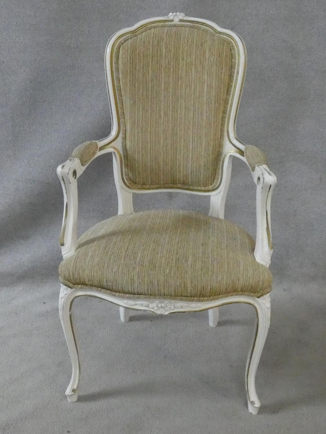 A set of eight Louis XV style distressed painted and gilt dining chairs in fawn upholstery on - Image 2 of 13