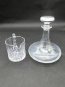 A cut crystal jug along with a crystal decanter with mushroom stopper. Engraved inscription. H.22cm