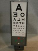 A vintage Hamblin motorised rotating optician's eye test light box. H.77