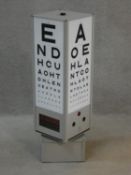 A vintage Hamblin motorised rotating optician's eye test light box. H.77 L.24 W.24cm
