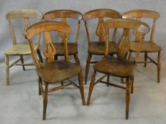 A set of six 19th century beech and elm bar back dining chairs with pierced splat above moulded