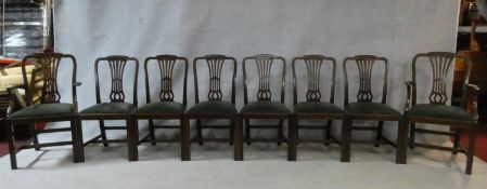 A set of eight late 19th century Georgian style mahogany dining chairs with pierced vase splats