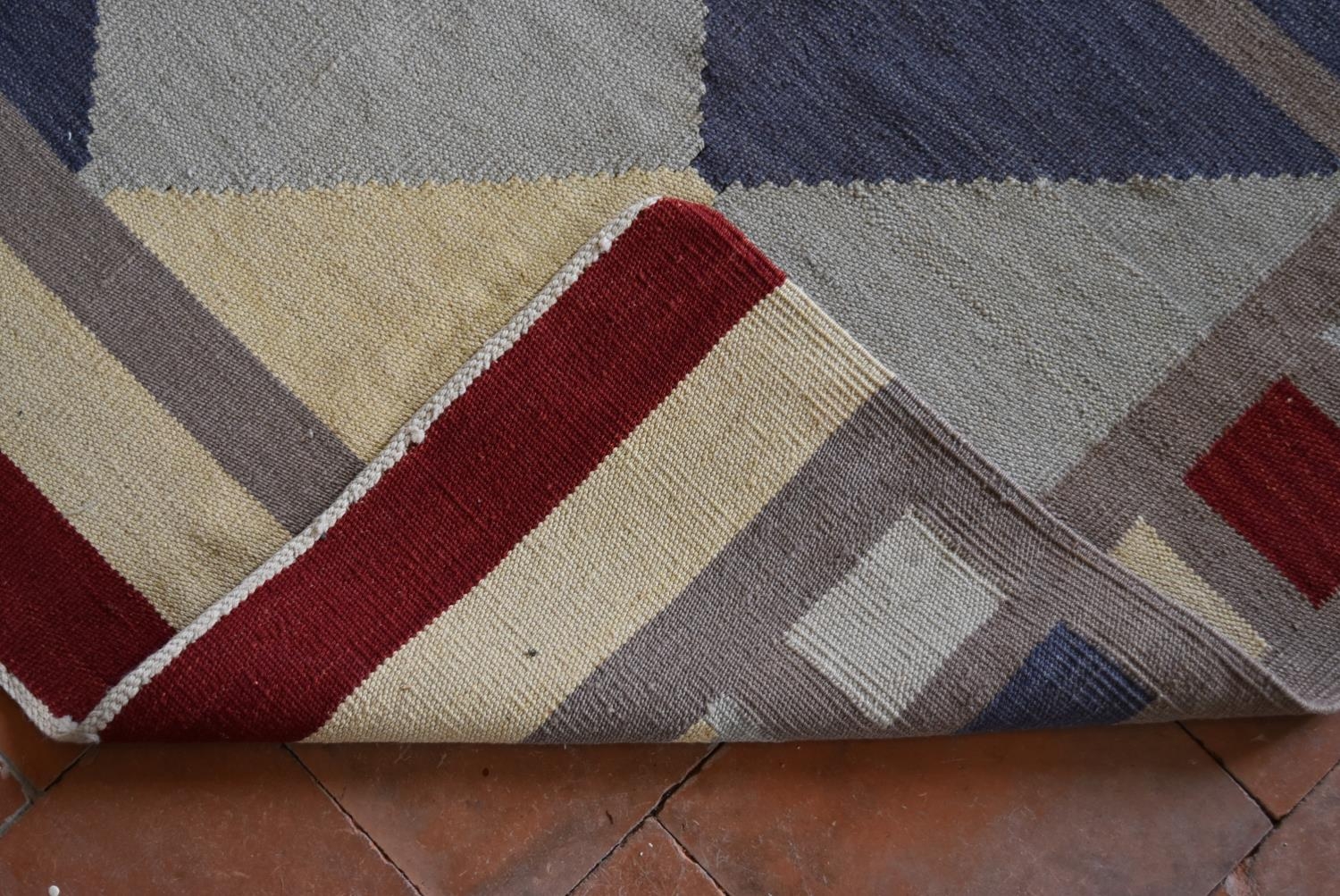 A Kilim with all over diamond design within a cube and banded border. L.239xW.179cm - Image 4 of 4