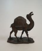 A Chinese bronze figure of a camel with a compartment under the hump with a lid pierced with