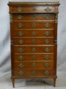 A 19th century French walnut tall chest with pierced brass galleried top and frieze drawer above