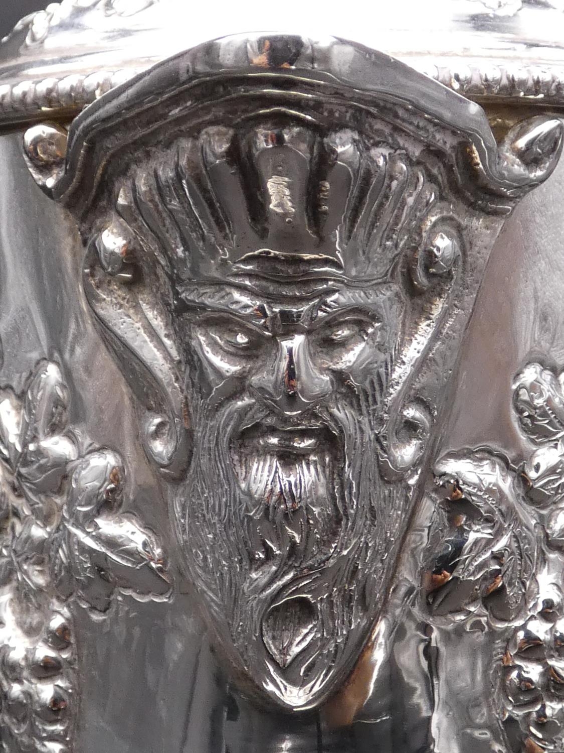 A silver plated and cut glass claret jug with repousse detailing. The glass jug has an engraved star - Image 4 of 8