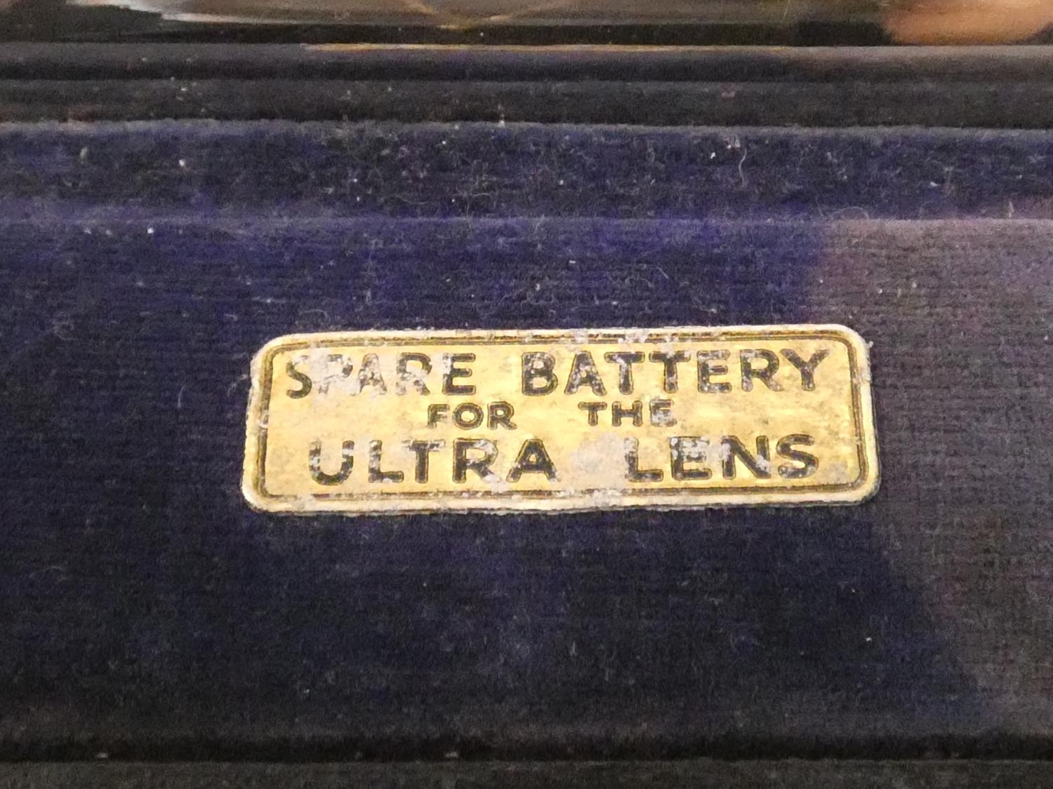 A wooden fishing tackle box with embossed plaque with trout along with an optician's Ultra Lense and - Image 7 of 13