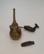 A collection of Indian brass items, including a brass two handled rose water sprinkler, a padlock in