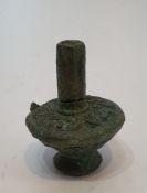 A Bactrian bronze cosmetic bottle, circa 2500 BC. H.11xW.8cm