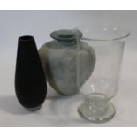 Three large glass vases. One John Lewis frosted black glass with faceted design, a clear glass