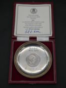 A red leather effect cased silver Winston Churchill centenary dish. With signature of Clementine