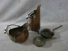 Two matching copper coal scuttles with blue and white ceramic handles along with two vintage