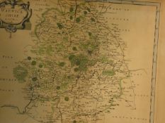 A framed and glazed Antiquarian map of Warwickshire engraved by Robert Morden with later hand