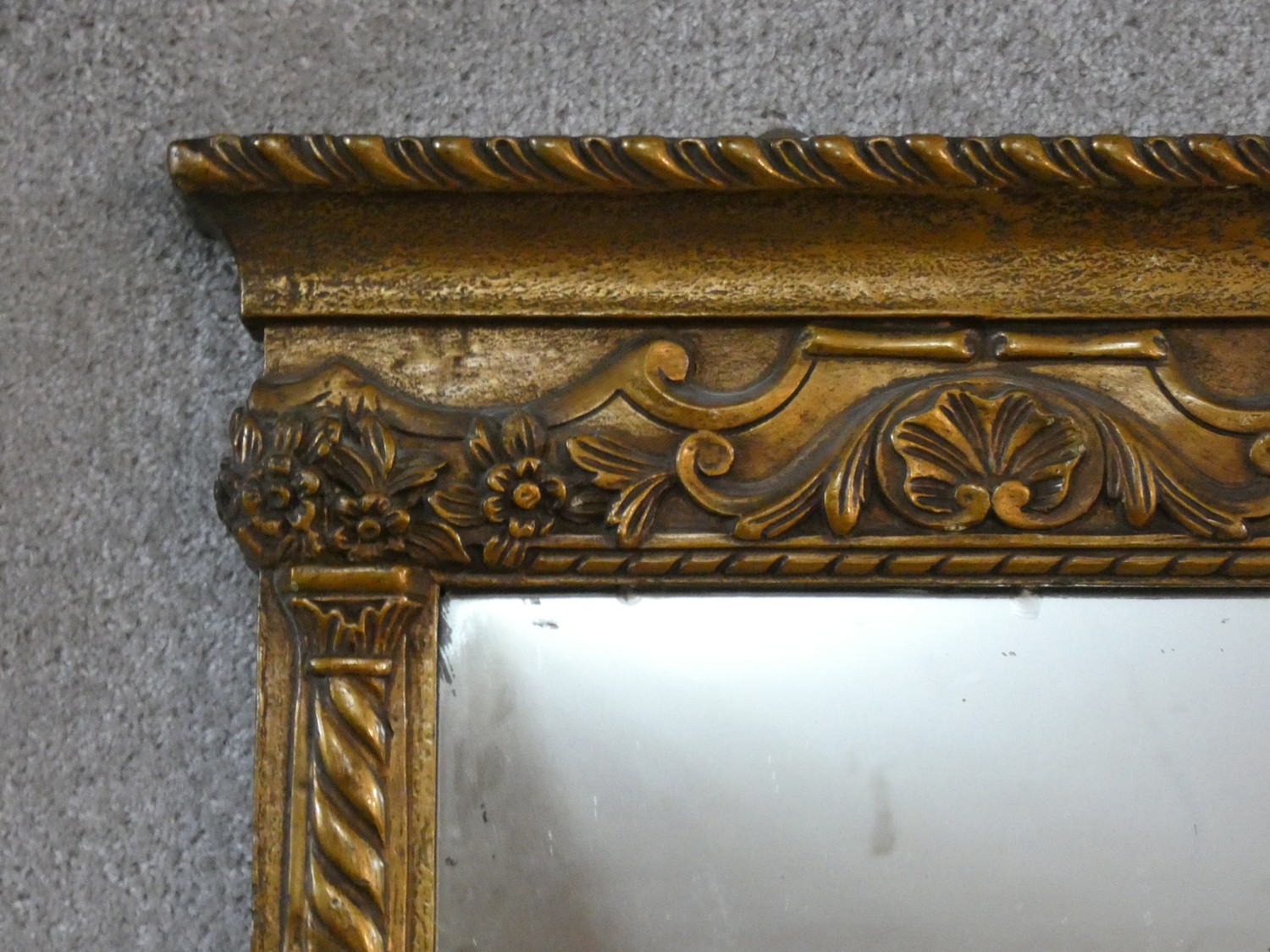 A 19th century gilt and gesso framed overmantel mirror with original plate flanked by spiral twist - Image 2 of 3