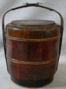 A Japanese cane lidded twin section basket with all over painted bird and flower decoration. H.57