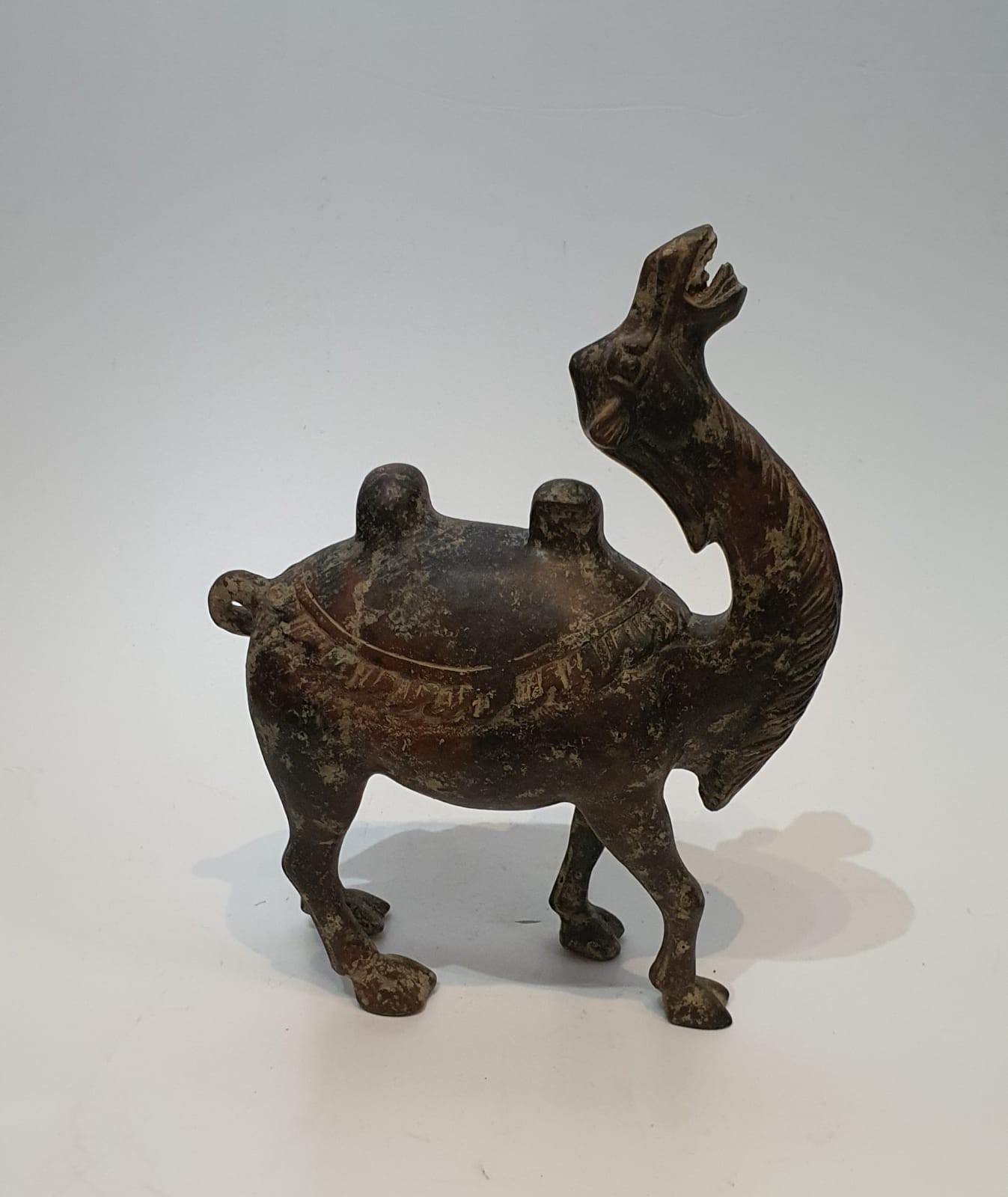 A Chinese Tang style ceramic glazed camel with head raised. H.28xW.30cm - Image 3 of 3