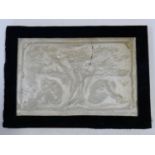 A framed classical style plaster relief plaque, figures beneath a tree, signed R L Nicholson. H.33