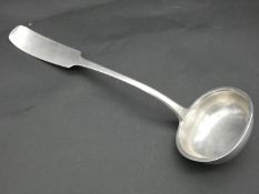 A 19th century Continental white metal soup ladle. Hallmarked and monogrammed. L.36cm 245g