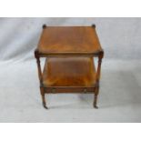 A late 19th century mahogany and crossbanded lamp table on turned supports united by undertier