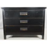 A Chinese style lacquered chest of three long drawers on block supports. H.90 W.120 D.54cm