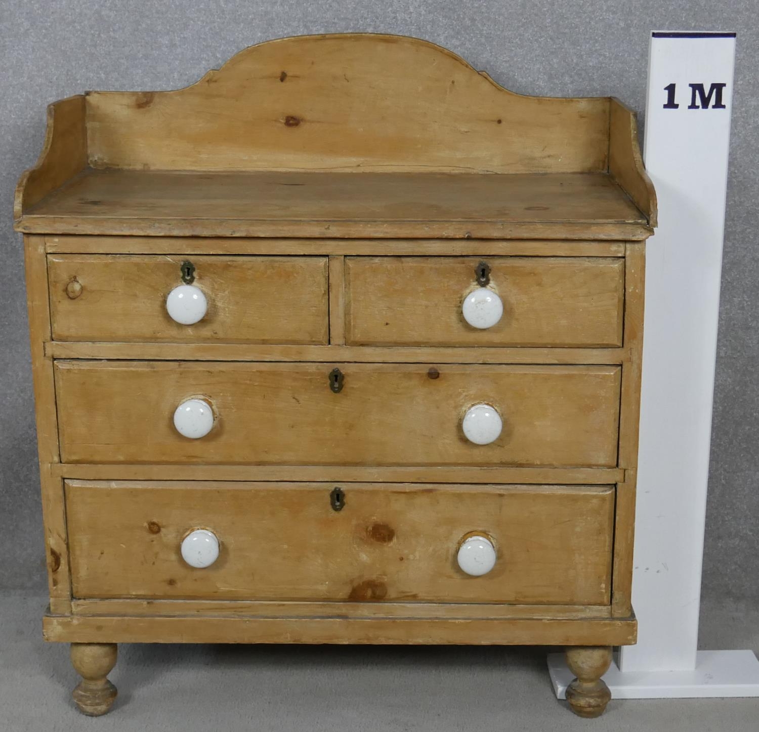 A Victorian pine chest with galleried back and porcelain handles on turned supports. H.97 W.85.5 D. - Image 6 of 6