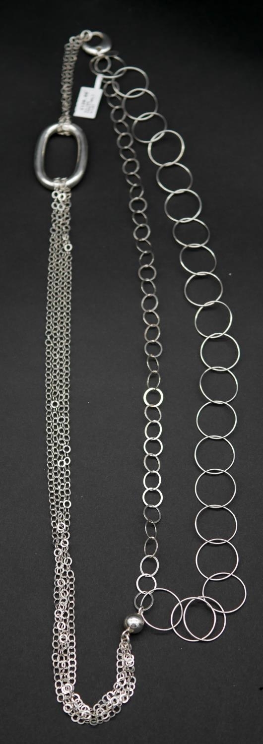 A Italian multi link long silver statement necklace, with various size and shape links, fastens with