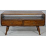A mid century vintage teak low table fitted with base drawers on dansette supports. H.46.5 L.89.5