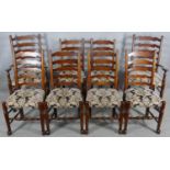 A set of eight oak Lancashire ladderback dining chairs in floral upholstery on turned stretchered