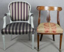 A painted Continental armchair and a 19th century inlaid Continental dining chair on sabre