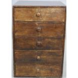 A vintage teak collectors chest of five drawers. H.48 W.33 D.38cm