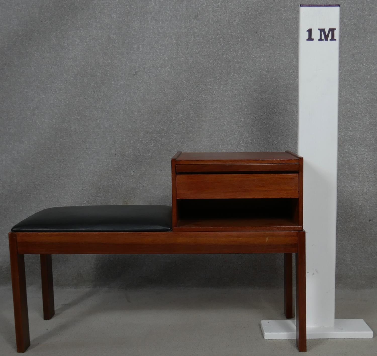 A 1970's vintage teak telephone table with pull out laminated directory board marked; Original - Image 7 of 7