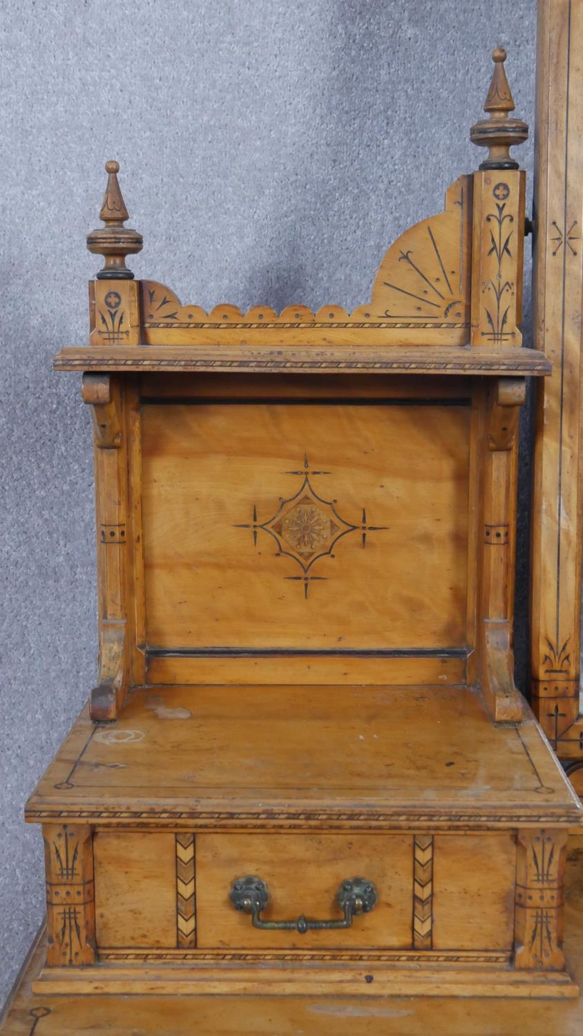 A late 19th century Aesthetic style walnut dressing table with incised carved decoration and ebony - Image 6 of 15