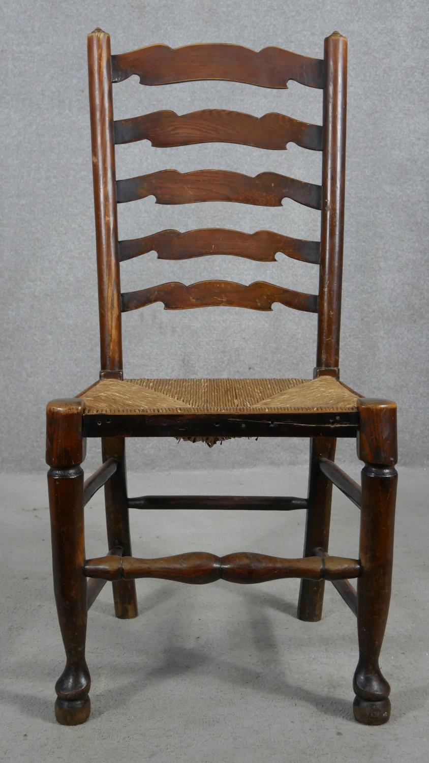 A set of six oak Lancashire ladderback dining chairs with woven rush seats on turned stretchered - Image 3 of 7