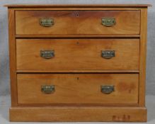 A late 19th century walnut chest of three long drawers on plinth base. H.77 W.92 D.53cm