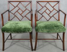 A pair of mahogany Chinese faux bamboo style open armchairs. H.88cm