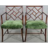 A pair of mahogany Chinese faux bamboo style open armchairs. H.88cm
