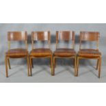 A set of four mid century vintage laminated ply stacking chairs with patent stamp for Tecta