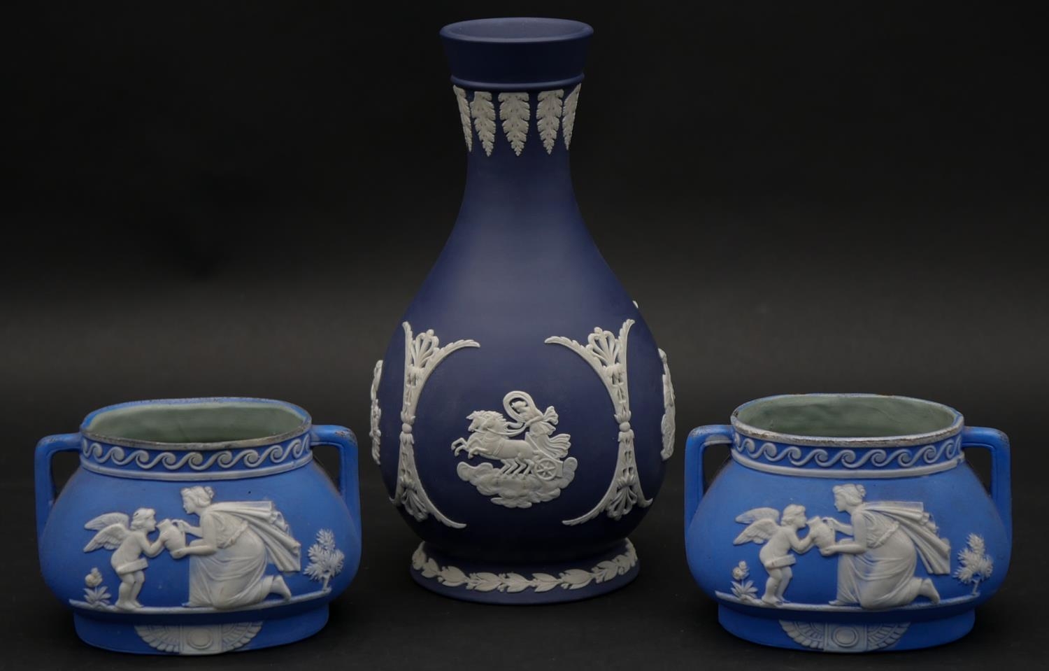 Three pieces of 20th century blue and white Wedgwood Jasperware. Including a pair of two handled