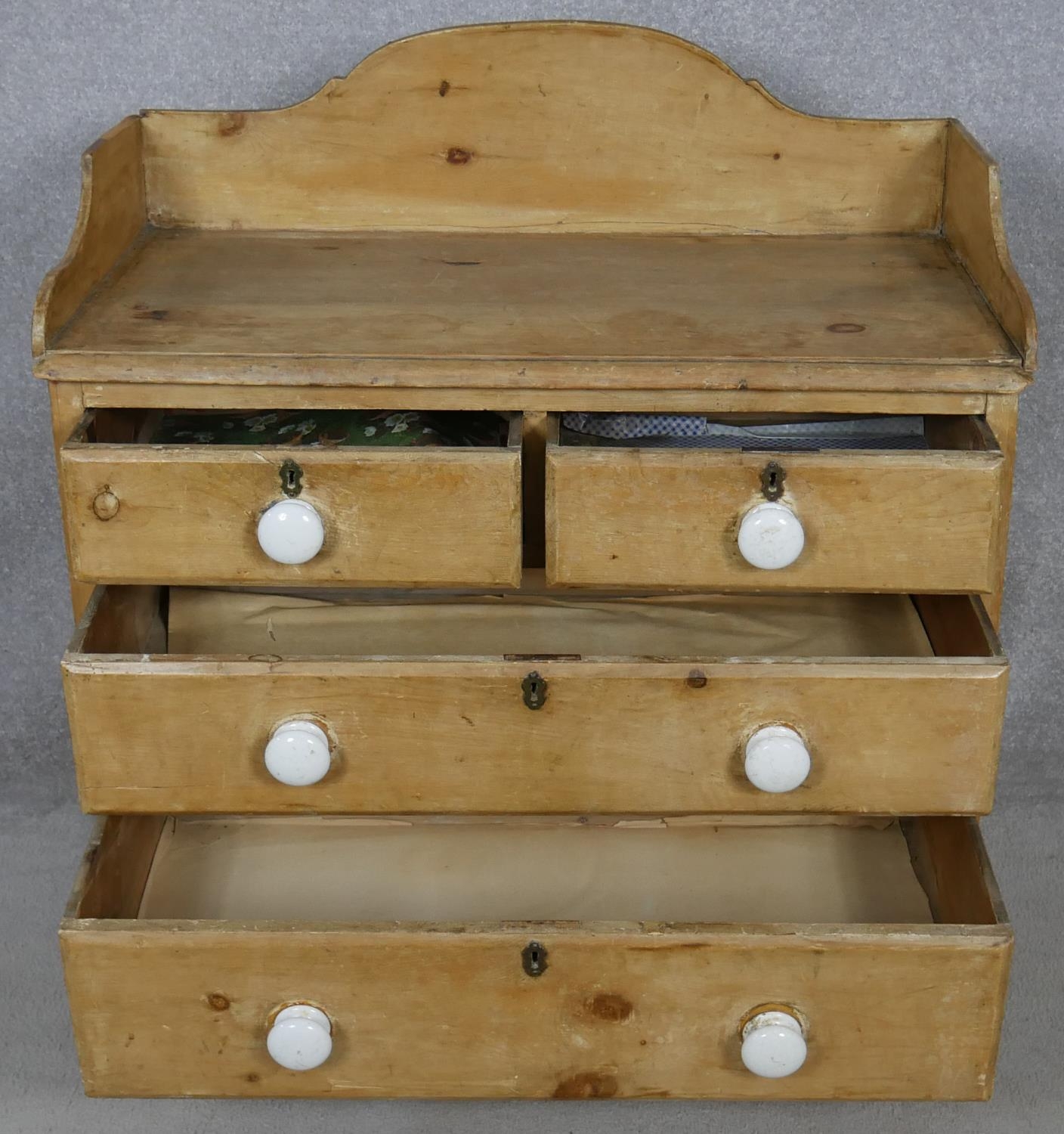 A Victorian pine chest with galleried back and porcelain handles on turned supports. H.97 W.85.5 D. - Image 3 of 6