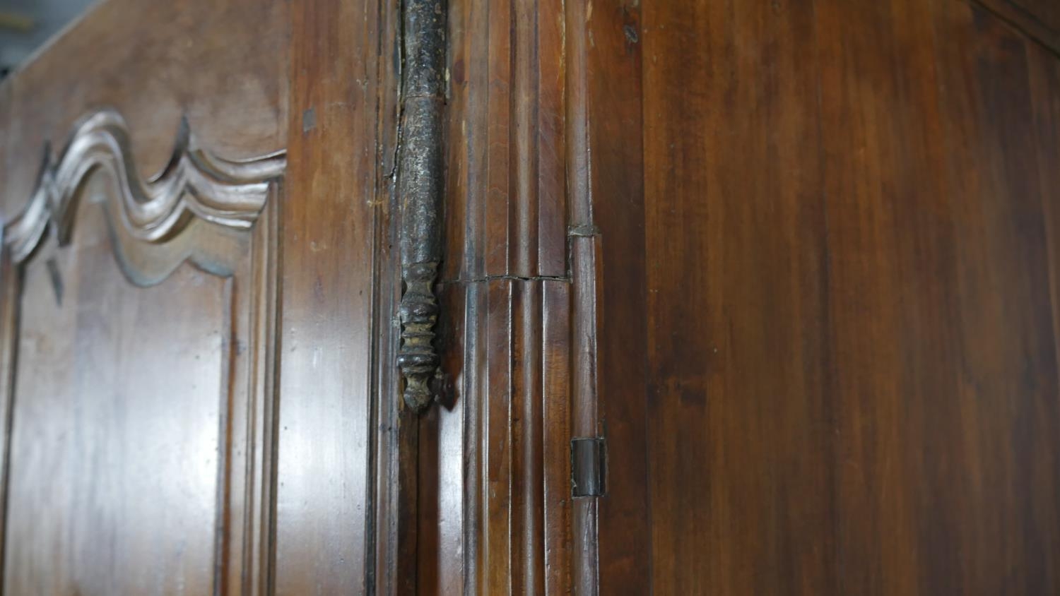 A 19th century carved chestnut French armoire. H.218 W.129 D.59cm (extensive woodworm damage and - Image 13 of 40