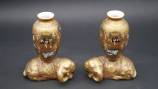 A pair of 19th century Meiji period gilded Satsuma vases. Each vase is mounted on a golden