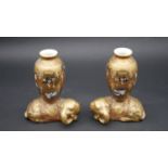 A pair of 19th century Meiji period gilded Satsuma vases. Each vase is mounted on a golden